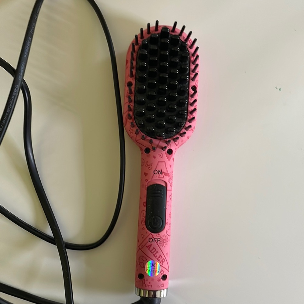 Amika TRAVEL SIZE straightening brush- used once.